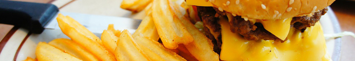 Eating Burger at Worthy Burger restaurant in South Royalton, VT.